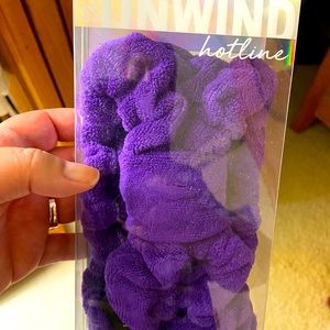 Brand new in box. Spa head band in purple terrycloth.